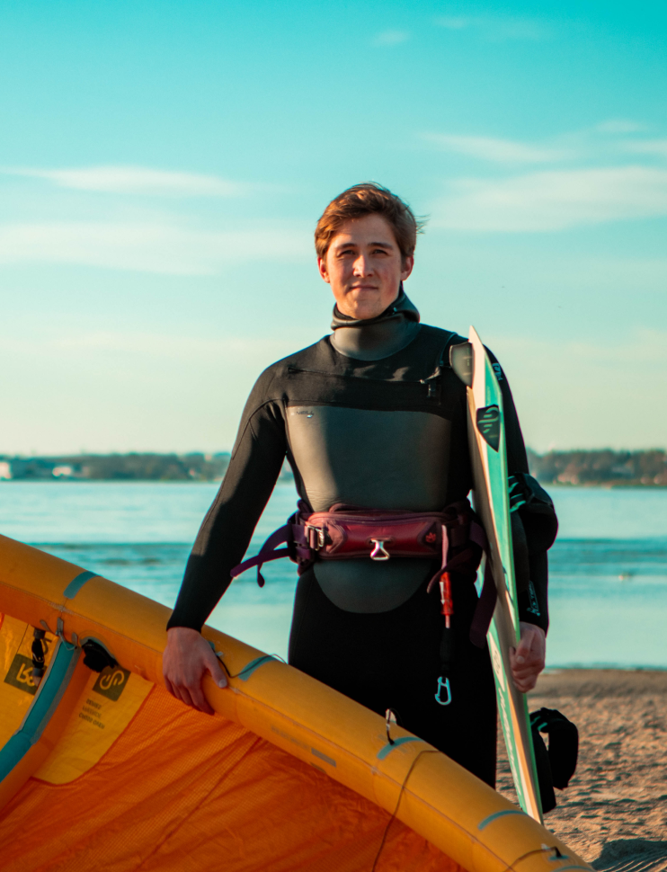 Rasmus Pertelson, community manager at Hathor Production, doing windsurfing